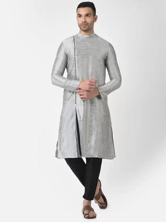Silver-black silk kurta and pyjama set for men, featuring a slitted design and a solid color scheme, presented on a plain white background.