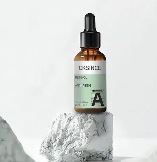 Retinol Anti-Aging Vitamin A Serum on marble background