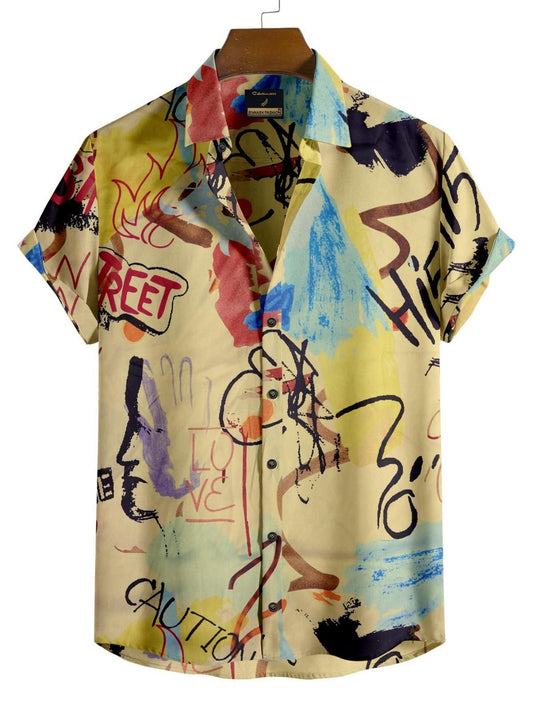 Vibrant Printed Casual Shirt
This image shows a vibrant, boldly printed casual men's shirt featuring an abstract, graffiti-inspired design in a variety of colors including yellow, blue, red, and black. The shirt has a regular fit and short sleeves, making it suitable for everyday casual wear.
