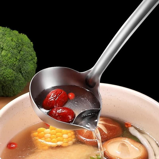 Stainless steel oil soup separator spoon used to separate oil and solids in a bowl of soup, showcased in the image with various vegetables and food items.